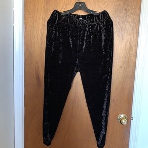 Black velvet pants.